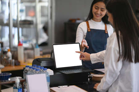 Happy coworkers discussing for new project planning in modern office.の写真素材