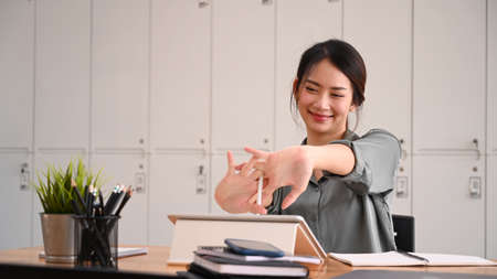 Young businesswoman using laptop computer virtual video conference with her business partner.の写真素材