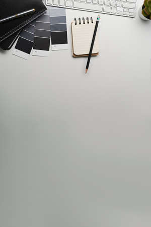 Close up view of computer tablet with blank screen on wooden table near window.の写真素材