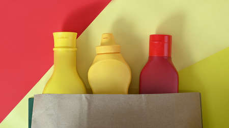 White office desk with mock up mobile phone, pencil holder, keyboard and notebook.の写真素材