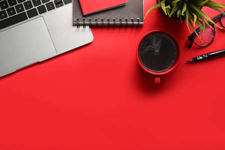 Home office desk with mock up computer with blank white screen.の写真素材