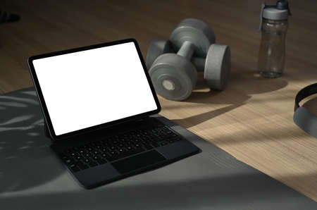 Mock up smart phone, notebook and coffee cup on woman workplace.の写真素材