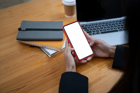 Headphone, keyboard, coffee cup and copy space on pink background.の写真素材