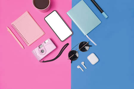 Mock up digital tablet and mobile phone with blank screen on wooden background.の写真素材