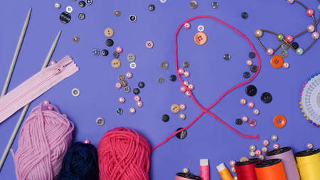 Notebook, stethoscope, glasses and coffee cup on blue background.の写真素材
