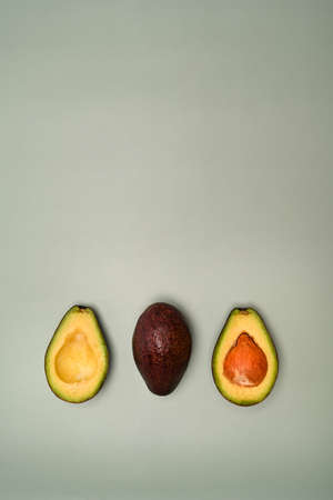 Close up view female holding avocado sandwiches for healthy breakfast.の写真素材