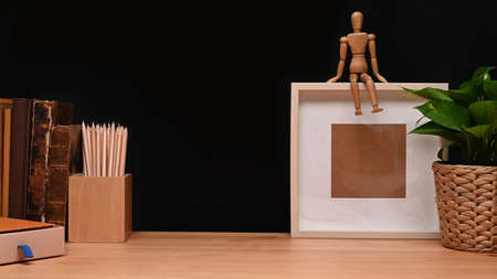 Whole and a half of avocado on wooden background. Top view.の写真素材