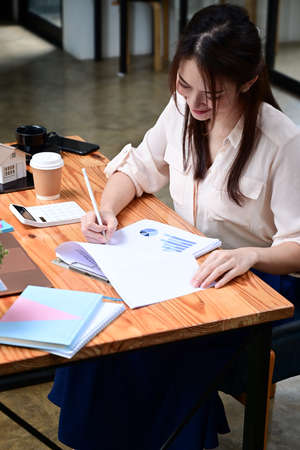 Female freelancer working with laptop computer.の写真素材