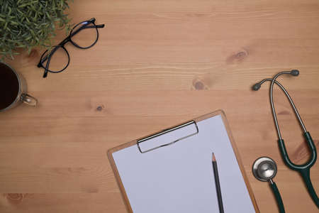 Above view man holding smart phone with white screen.の写真素材