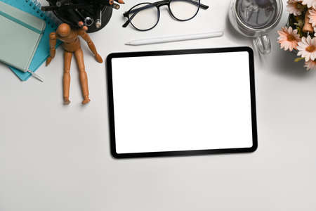 Mock up digital tablet, smart phone, camera and glasses on white background.の写真素材