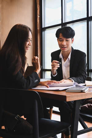 Team of HR departments read resume together for selection of new staff representatives.の写真素材