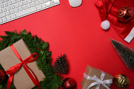 Above view Christmas gift boxes on red background.の写真素材