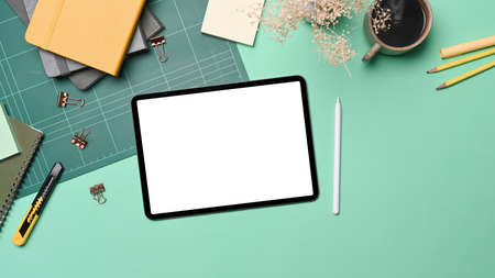 Mock up digital tablet, stylus pen and stationery on colorful background.