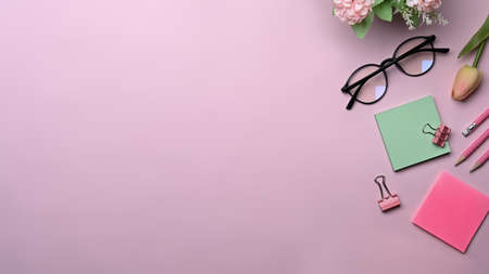 Small business owner talking on mobile phone and writing address on cardboard box.の写真素材