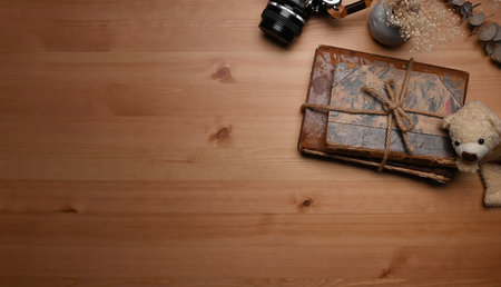 Top view stylish workplace with empty notebook, laptop computer and coffee cup.の写真素材