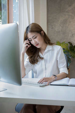 Portrait beautiful asian woman working with modern computer at office.