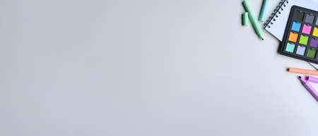 Top view color swatches and stationery on white table with copy space.の写真素材