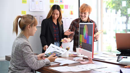 Team of website designer planning application development sketch template layout, framework, wireframe at modern office.の写真素材