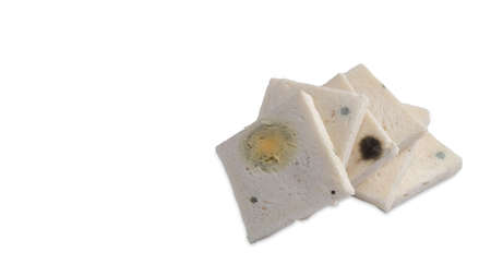 Moldy bread, expired bread isolated on white background with copy space.の写真素材