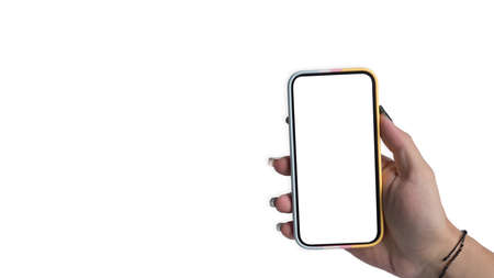 Mockup image of woman hand holding smart phone with empty screen isolated on white background.の写真素材