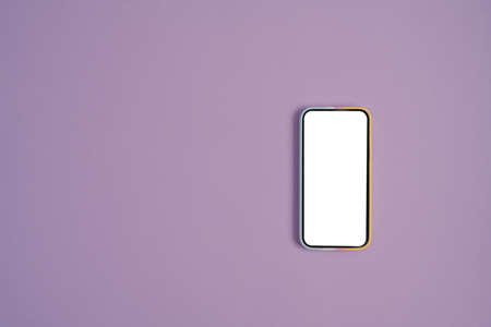 Mockup smart phone on purple background with copy space for your information content.の写真素材