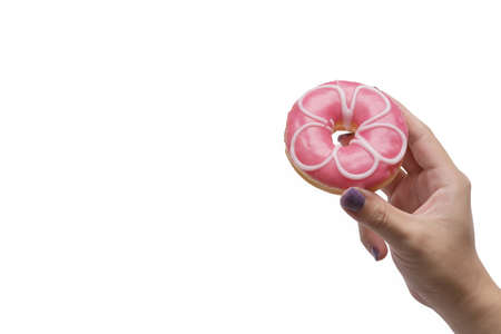 Woman holding tasty donut on white background. Copy space for your text.