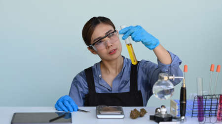 Scientist research for marijuana natural aromatic hemp oil cannabis leaves alternative herb medicine and alternative medicine for health. Herbal alternative concept.の写真素材