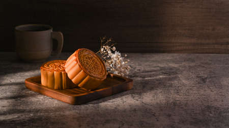 Chinese moon cakes on rustic stone background. Happy mid Autumn festival.の写真素材