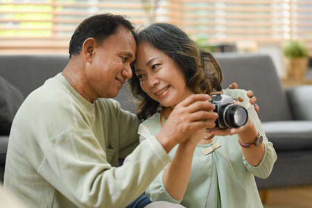 Romantic retired couple getting ready for travel vacation after quarantine. Traveling in retirement concept.の写真素材