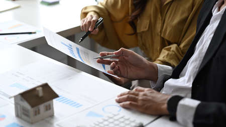 Financial advisor consulting property purchase with client at office. Real estate, mortgage loan and...