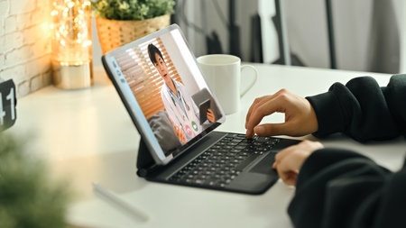 Cropped shot of woman having online consultation with doctor on digital tablet. Therapist online,...