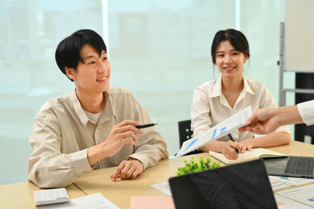 Group of startup business people collaborating sharing idea for new project at co working space..の写真素材