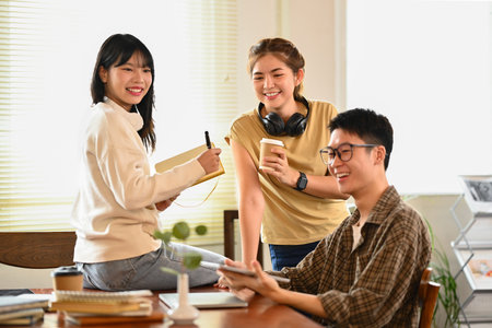 Creative business team brainstorming and preparing startup presentation in modern office.の写真素材