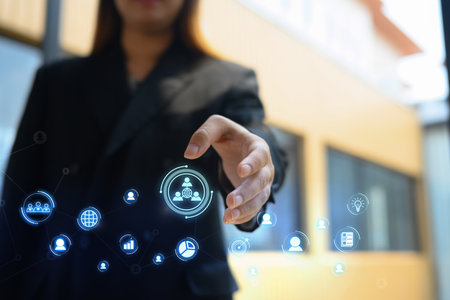 Businesswoman offering hand for handshake. Concept of business deal proposal and collaboration.の写真素材