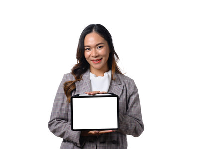 Portrait of beautiful businesswoman in classic formal suit standing on white background.の写真素材