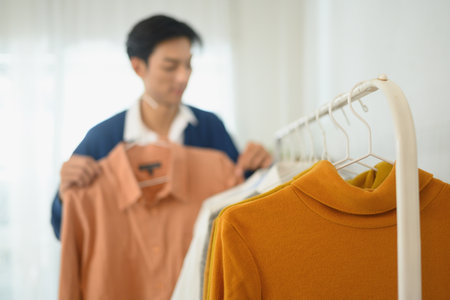 Small business owner managing inventory and preparing products for sale.の写真素材