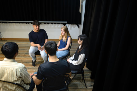 Support group meeting where participants engage in open discussion for mental health and recovery.