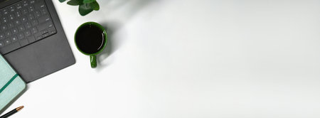 Copy space, Top view office table desk with computer, coffee, pen, leaves.の写真素材