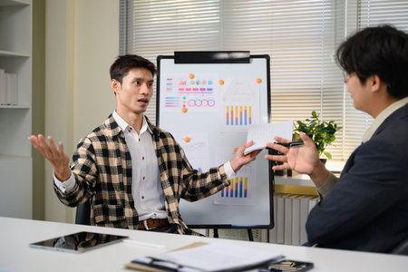 Pitching series photo, man presenting and pitching business ideas at boardroom.の写真素材