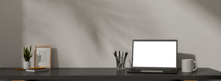3D render office desk with laptop, office supplies, houseplant, coffee mug, photo frame.