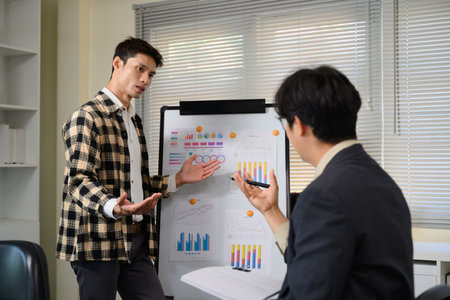 Pitching series photo, man presenting and pitching business ideas at boardroom.