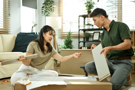 Photo series of young asian couple assembly a new furniture at home.
