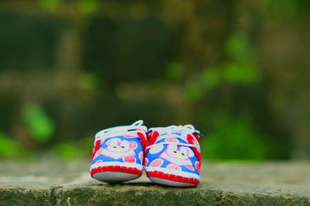 A new born baby girl shoesの写真素材