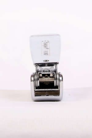 A stapler used to attach a bunch of papersの写真素材