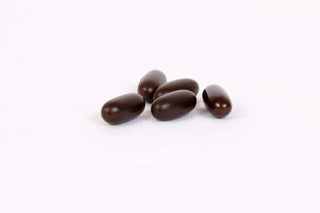 The multivitamin pills in brown colourの写真素材