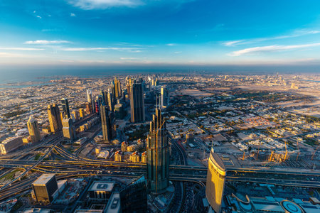 Dubai, UAE - APRIL 25, 2016: Dubai Skyline while the sunset in Dubai on April 25, 2016 in the United Arab Emirates.のeditorial素材