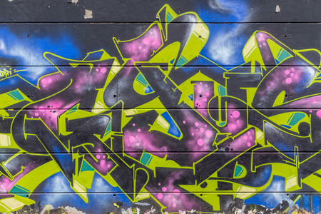 UDINE, ITALY DECEMBER 31, 2017 Beautiful street art graffiti abstract creative drawing fashion colors on the walls of the cityのeditorial素材