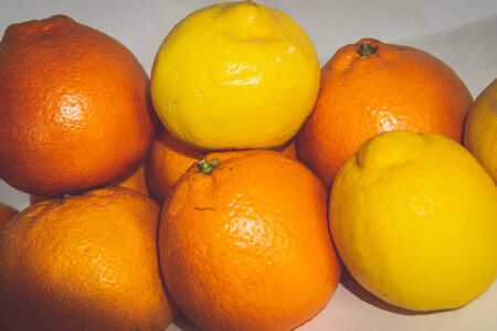 A bunch of oranges sitting on a table. High quality photoの写真素材