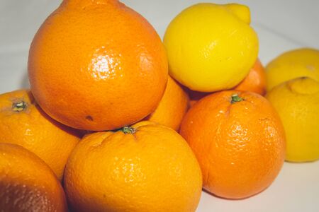 A pile of oranges sitting on a table. High quality photoの写真素材
