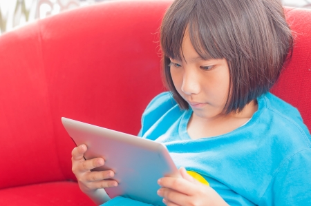 Closeup portrait of Asian little girlの写真素材